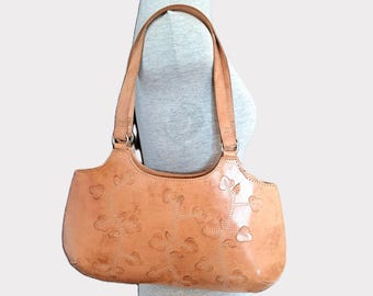 Bolso vintage de piel color canela con apliques florales