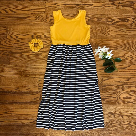 white top yellow bottom dress