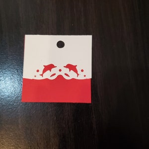 10 tag dei delfini rossi