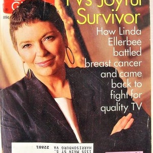 May include: A magazine cover featuring a woman with short brown hair wearing a black blazer. The cover text reads "TV's Joyful Survivor" and "How Linda Ellerbee battled breast cancer and came back to fight for quality TV".
