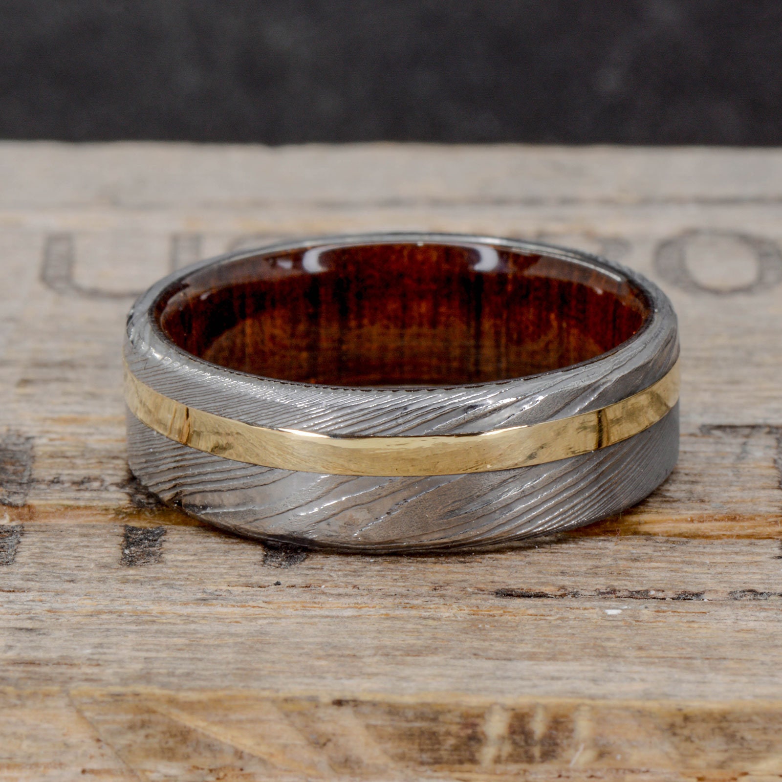 Hand-Wrought Interior Twisted Damascus Steel and Bourbon Barrel Oak Wooden Ring — Wedgewood Rings