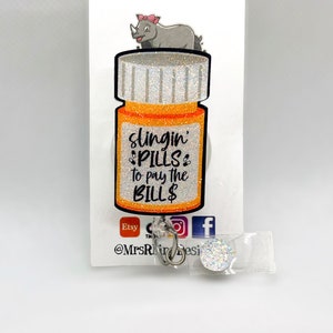 Slinging Pills Glitter Badge Reel: Nurse RN Pharmacy ID Holder