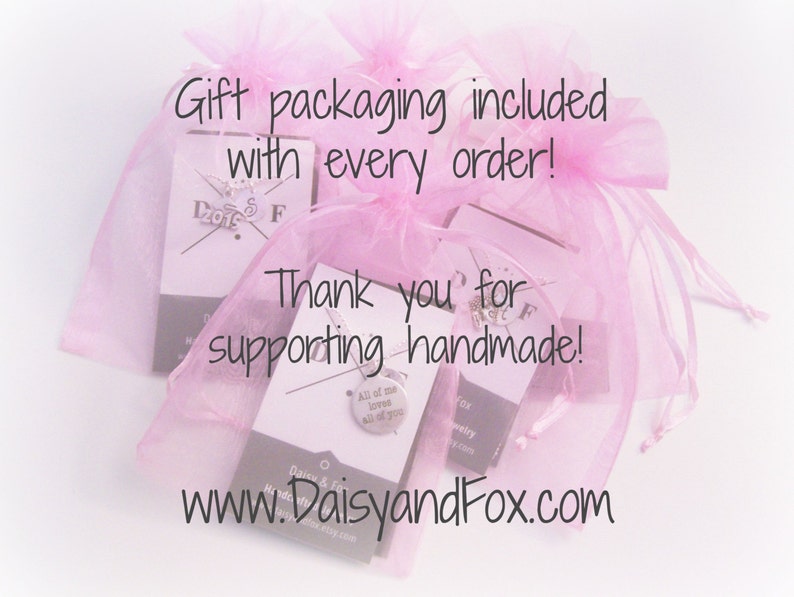 May include: Pink organza gift bags with white cards that say "Gift packaging included with every order!" and "Thank you for supporting handmade!"  The website address www.DaisyandFox.com is printed on the bottom of the card.