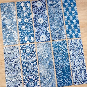 May include: Set of ten blue and white patterned bookmarks. The bookmarks feature a variety of floral and geometric designs.