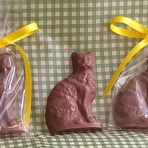 Our solid chocolate Cats. The purrrfect gift for any Cat Lover!  Please DO NOT order if the area you are shipping to exceeds 65 degrees.