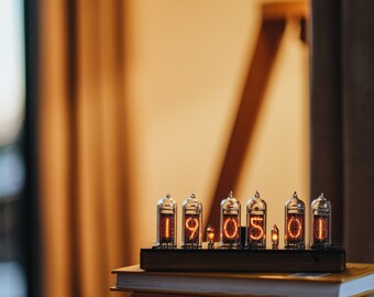 スリムな木製筐体とプラスチック製トップカバーを備えた IN-14