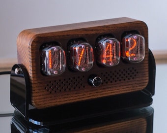 IN-12 Nixie clock in perforated wooden case with plastic stand (Red enclosure)