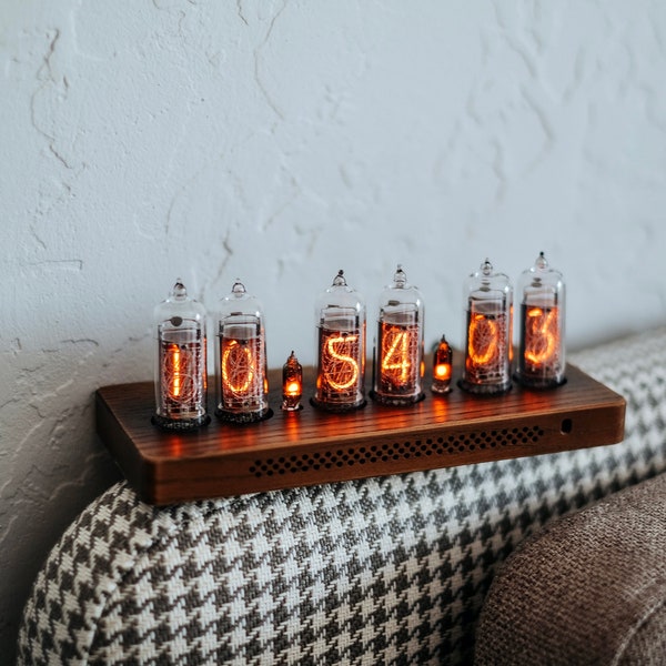 IN-14 Nixie clock in slim wooden enclosure with a clear plastic bottom cover.