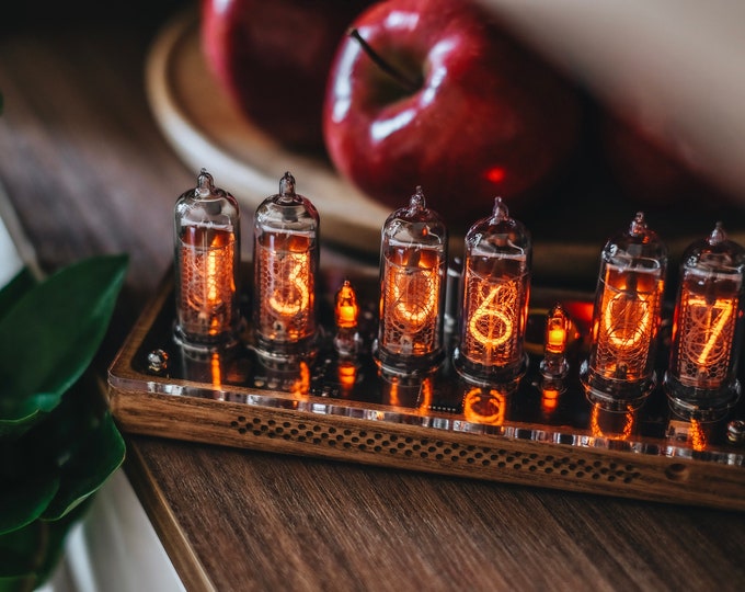 IN-14 Nixie clock in slim perforated wooden case with clear plastic top cover.