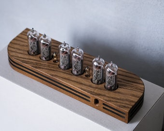 Asymmetric time capsule - IN-14 Nixie clock in wooden case with a plastic bottom cover