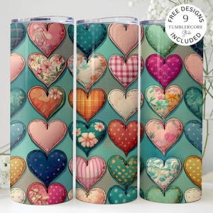 May include: A set of three stainless steel tumblers with a repeating pattern of colorful, quilted hearts. The hearts feature various floral, polka dot, and plaid designs on a teal background. The tumblers have a silver lid and the text "FREE DESIGNS 9 TUMBLERCORE Studio INCLUDED".