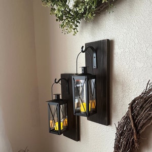 Wood Sconce with Black Hanging Lantern Farmhouse Rustic Vintage Style Lantern Candle Holder with Timer Cozy Home Decor Front Porch Cozy Fall Decorations Housewarming Gift Country Wall Sconce Over the Bed Wall Decor Christmas Gift Country Living Style