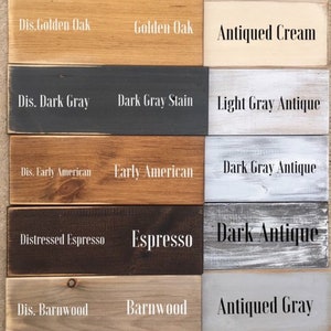 May include: A wood stain color chart with 12 different wood stain colors. The colors are labeled with names like "Distressed Walnut", "Walnut", "Antiqued White", "Dis. Golden Oak", "Golden Oak", "Antiqued Cream", "Dis. Dark Gray", "Dark Gray Stain", "Light Gray Antique", "Dis. Early American", "Early American", "Dark Gray Antique", "Distressed Espresso", "Espresso", "Dark Antique", "Dis. Barnwood", "Barnwood", "Antiqued Gray", "Distressed Black", and "Antiqued Seafoam".