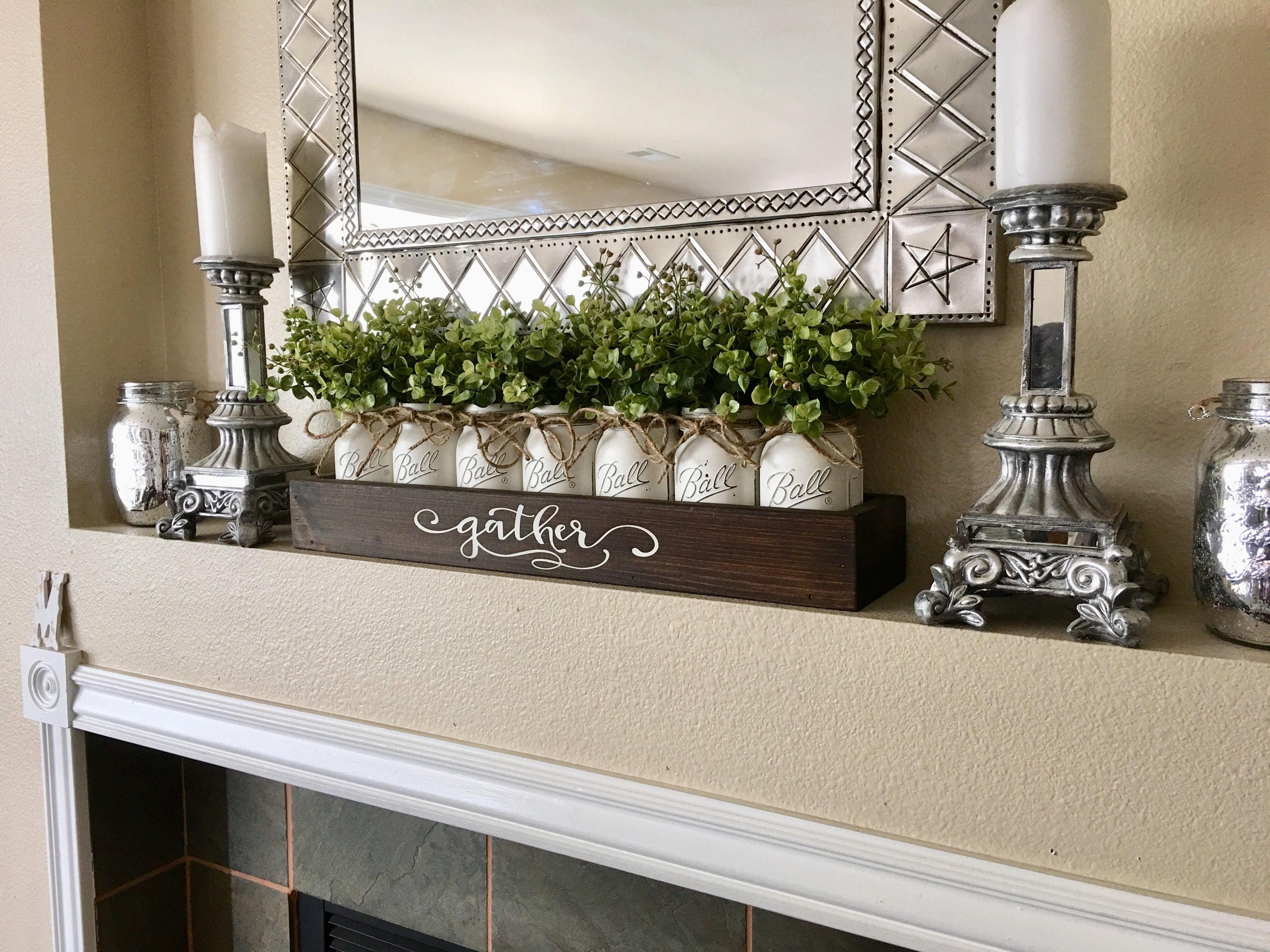 Mason jar candle holders on mantle