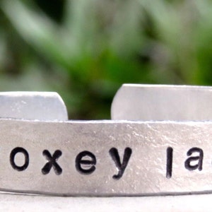 Jimi Hendrix, FOXEY LADY handstamped bracelet, Jimi Hendrix jewelry, classic rock bracelet, lyrics bracelet, aluminum or copper, textured