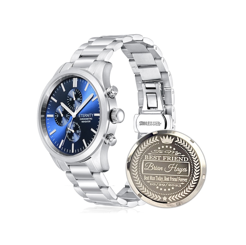 May include: A silver chronograph watch with a blue face and a stainless steel band. The back of the watch has an engraved message that reads "To My Best Friend Brian Hayes Best Man Today, Best Friend Forever 10/29/2023".