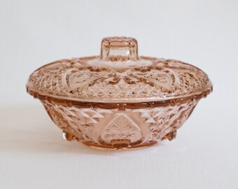 1970s KIG Indonesia pink glass lidded candy bowl, hearts and roses design