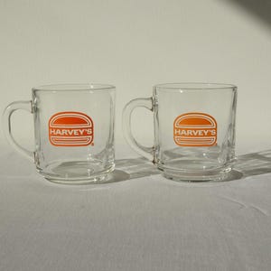 vintage KIG clear Harvey’s mugs, set of two