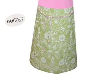 green, light skirt with belt