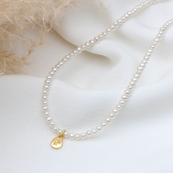 Zodiac pearl necklace deals