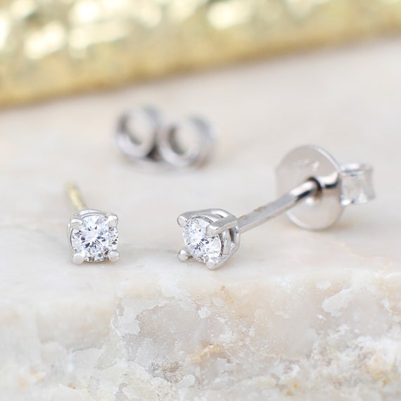 9ct yellow .10ct diamond studs 9ct yellow .10ct diamond studs