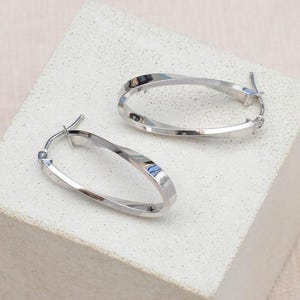 9ct White Gold Twist Oval Hoop Earrings