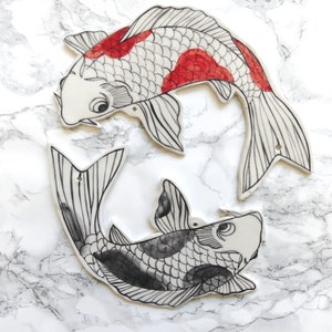 Ceramic carps, wall decoration