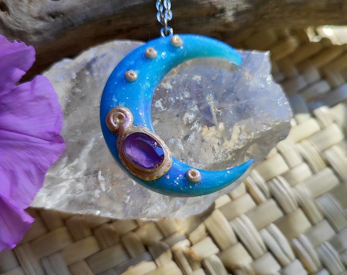 Amethyst crescent moon pendant, handmade in polymer clay with opal blue effects