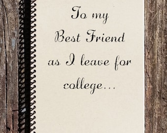 May include: A spiral bound notebook with a cream colored cover and black ink. The notebook has the text "To my Best Friend as I leave for college..." written on the cover.