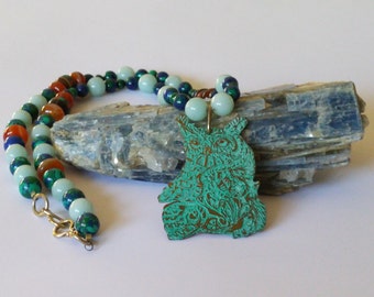 Handcrafted green patina etched brass owl beaded necklace.