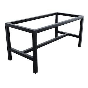 May include: Black metal table base with a rectangular top and a single support beam. The base is made of square tubing and has a simple, industrial design.