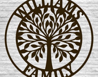 Könnte beinhalten: Ein schwarzer Metallkreis mit den Worten "Williams Family" am Rand. In der Mitte befindet sich ein stilisierter Baum mit Blättern.