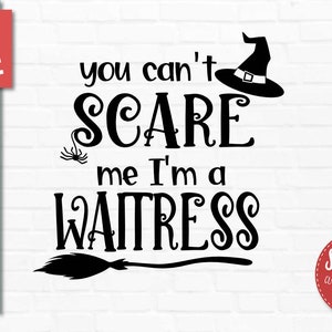 May include: Black and white graphic design with a witch's hat and a spider. The text reads "You can't scare me I'm a waitress".