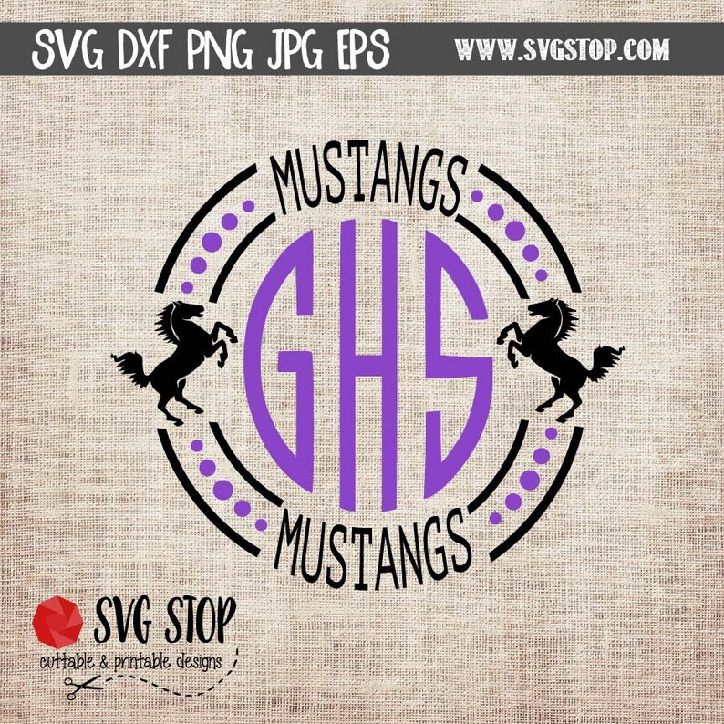 May include: A purple circle with the letters GHS inside and the word "MUSTANGS" above and below the circle. Two black silhouettes of horses are on either side of the circle.