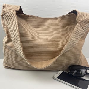 Cream Corduroy Shoulder Bag  Design Handmade with cotton lining and Pocket  Handmade in Australia. Wide 45 High 32cm strap 45cm long