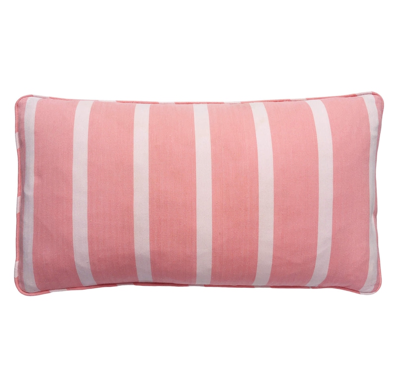May include: A pink and white striped lumbar cushion. The cushion is made of a soft, woven fabric and has a rectangular shape.