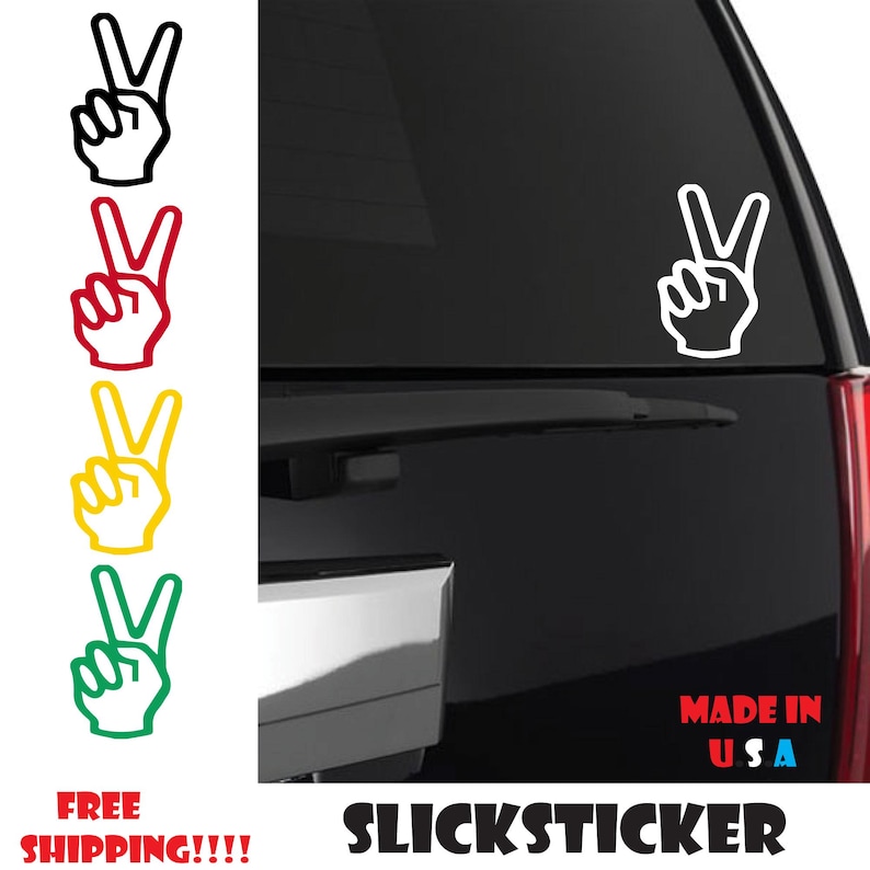Puede incluir: Una pegatina de signo de paz blanco en un coche negro con el texto "Made in U.S.A." y "SlickSticker" debajo. La pegatina tambi&eacute;n se muestra en cuatro colores diferentes: negro, rojo, amarillo y verde.