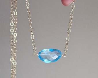 Swiss Blue Topaz Necklace in 14k Gold Filled with Rainbow Moonstone Accents