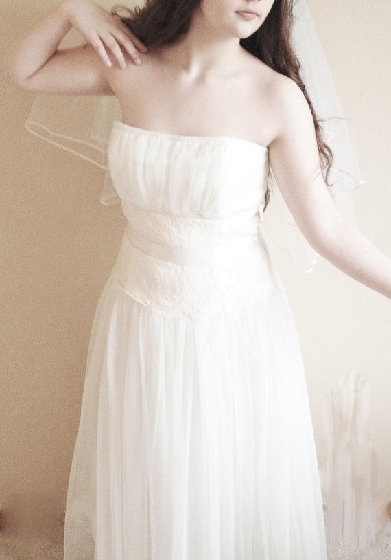white mid length wedding dress