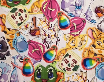 May include: A collection of colorful stickers featuring cartoon animals, food, and other whimsical designs. The stickers are printed on white paper and have a glossy finish.