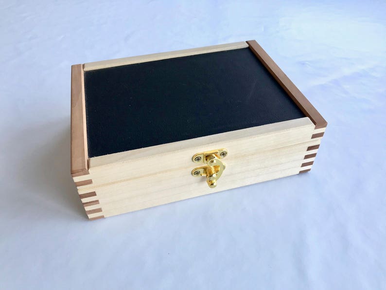 Straight razor storage box for seven razors. Handmade from Etsy