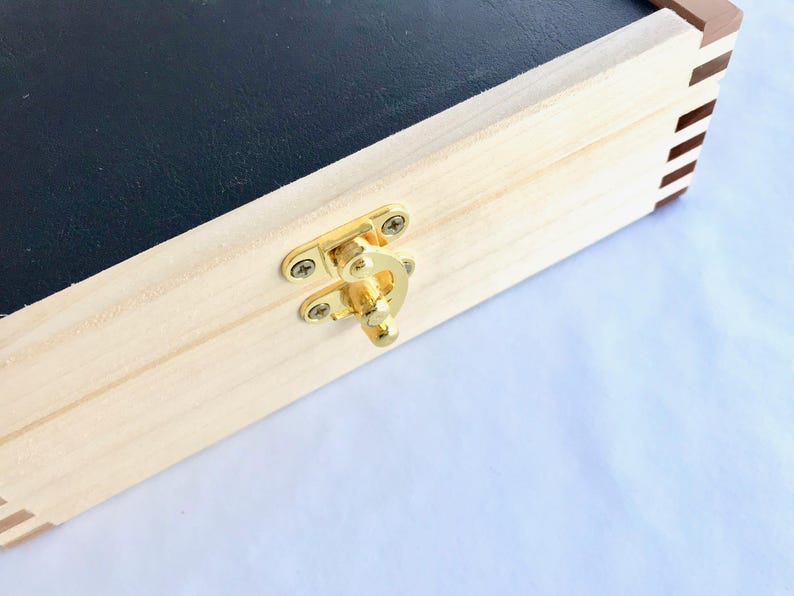 Straight razor storage box for seven razors. Handmade from Etsy