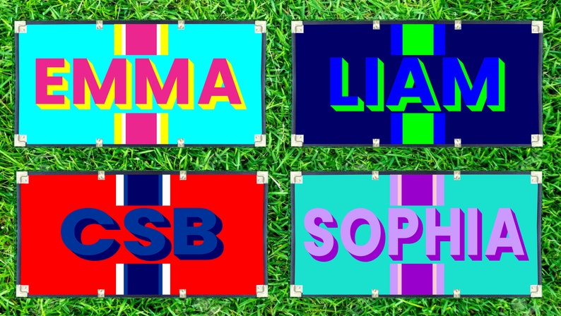 May include: Four rectangular signs with names and initials. "EMMA" in pink and yellow on a turquoise background. "LIAM" in blue and green on a navy background. "CSB" in blue on a red background. "SOPHIA" in purple on a teal background.