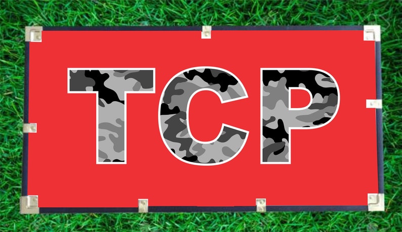 May include: A red banner with the word "TCP" in white letters with a camouflage pattern.