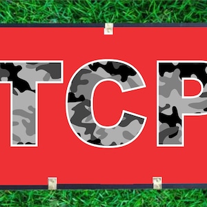 May include: A red banner with the word "TCP" in white letters with a camouflage pattern.