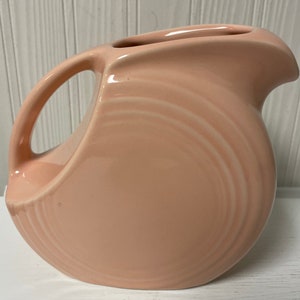 Fiestaware disk SMALL juice 5&quot; pitcher Fiesta Ware retired Apricot Peach