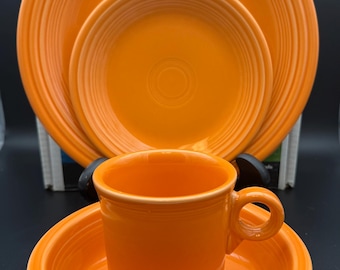 Fiesta Ware retired Tangerine Orange 4 piece place setting Fiestaware new in box 1st quality