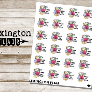 May include: A sheet of stickers with illustrations of cleaning supplies and the text "Clean the House". The stickers are on a white background with a woodgrain background behind the sheet.
