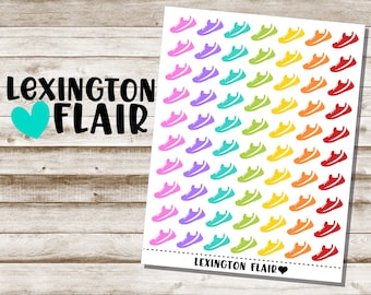 May include: A sheet of stickers featuring colorful running shoe designs in various colors, including purple, teal, green, yellow, orange, and red. The sheet also includes the text "Lexington Flair" with a teal heart on a wooden background.