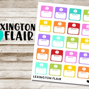 May include: A printable sheet of 20 colorful weight tracker stickers with a donut design. Each sticker has the word "WEIGHT" printed on it.